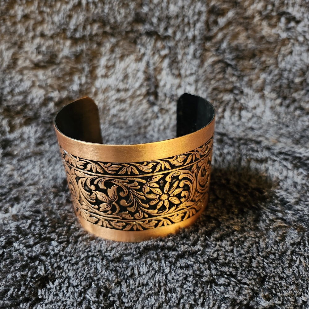 Intricate Gold and Black Cuff Bracelet